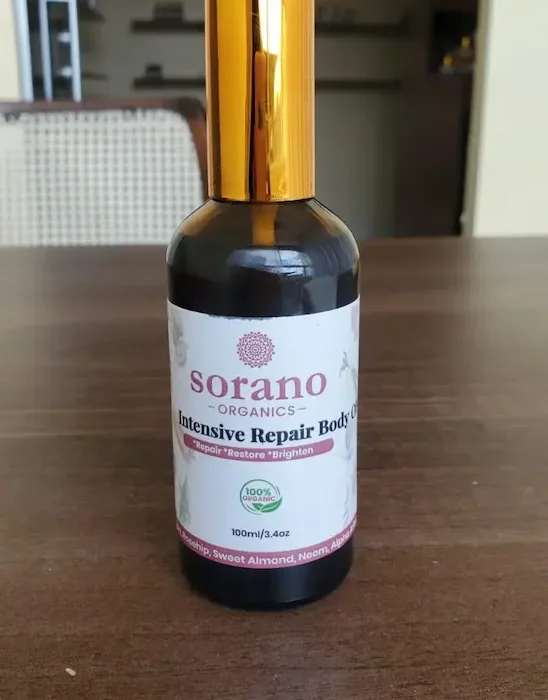 ⁠Sorano intensive Repair Body Oil Repair bottle on a clean background, showing the golden texture of the repair oil.